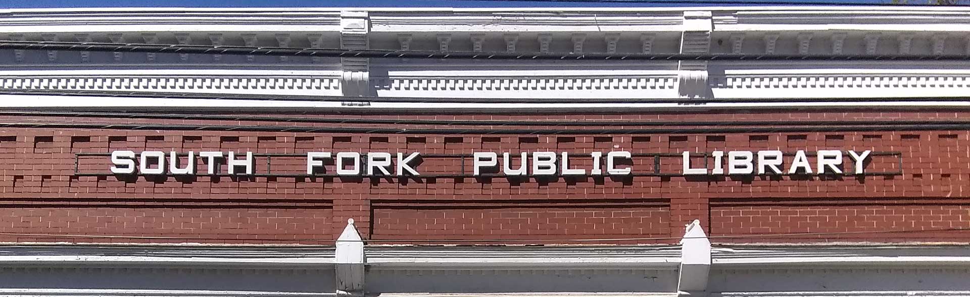 A white sign reads "South Fork Public Library"